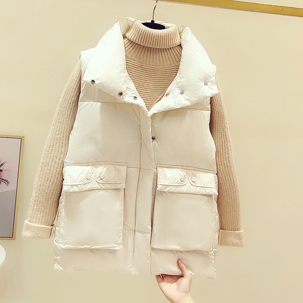 Női alkalmi mellény zsebekkel és gombokkal