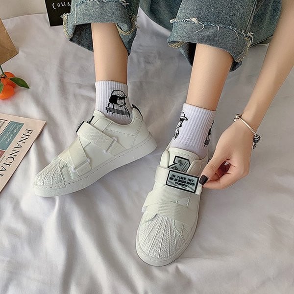 Női alkalmi tornacipő lapos talppal és foltokkal