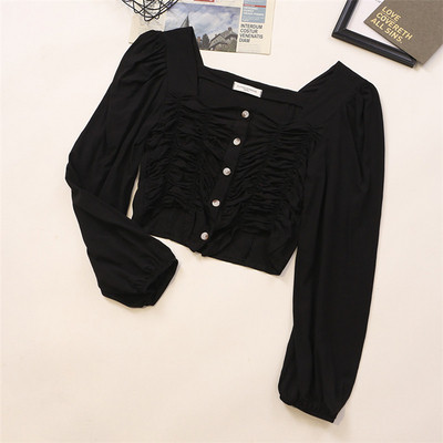 Kandilise kaelusega ja pikkade varrukatega naiste särk