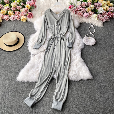 Női alkalmi kombiné gombokkal és hosszú ujjakkal