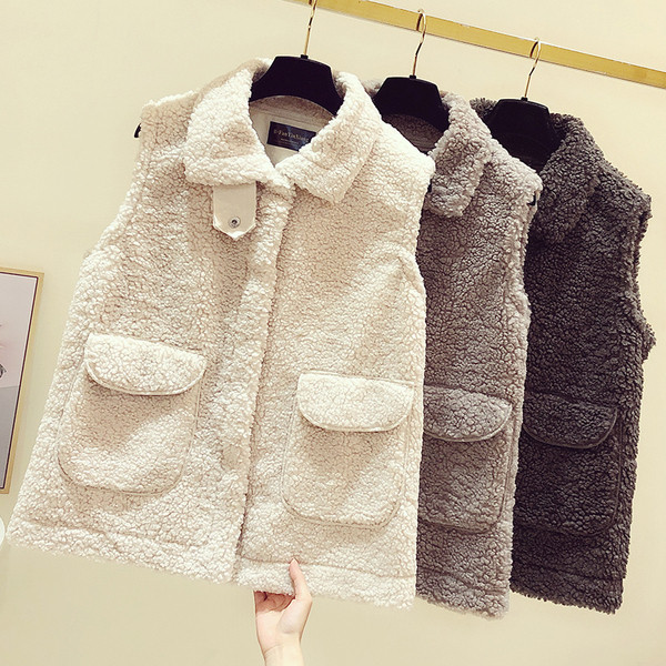 Női pehelymellény zsebekkel és cipzárral