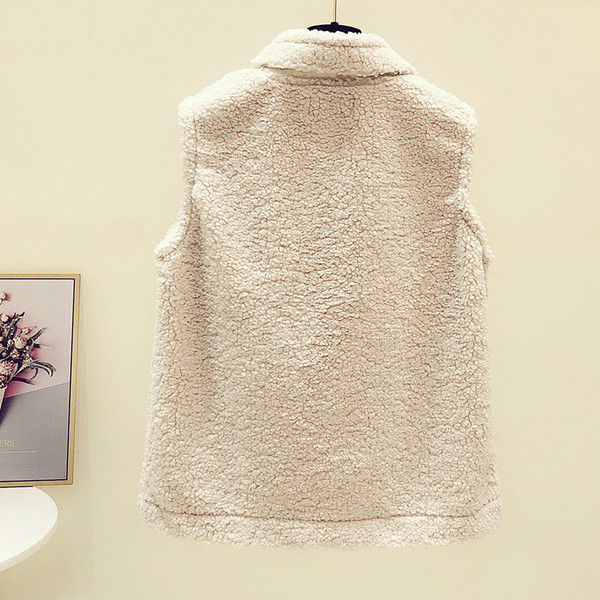 Női pehelymellény zsebekkel és cipzárral