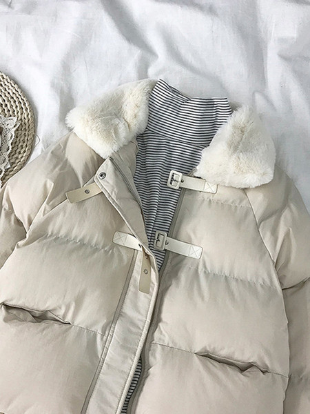 Női alkalmi kabát pehelytal és zsebekkel