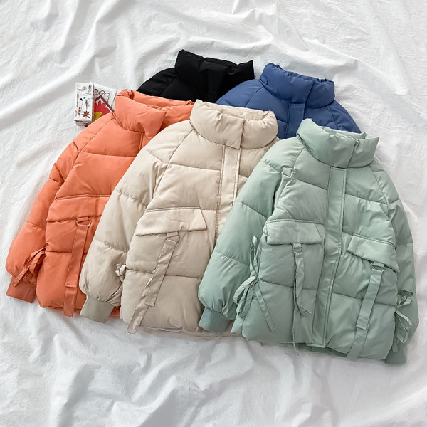 Uue mudeli kõrge krae ja taskutega talvejope