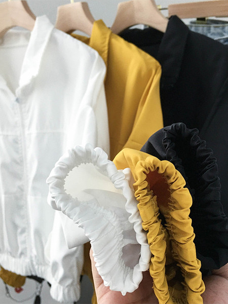 Vékony tavaszi-őszi kabát cipzárral