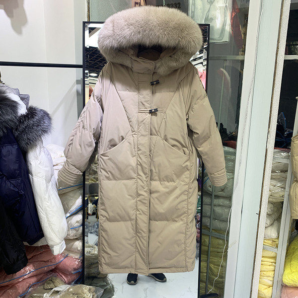 Naiste talvejope pikk mudel kapuutsi ja sulestikuga