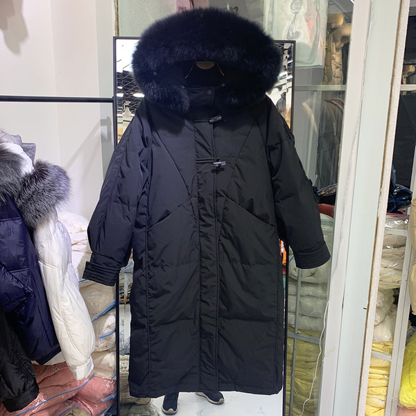 Naiste talvejope pikk mudel kapuutsi ja sulestikuga