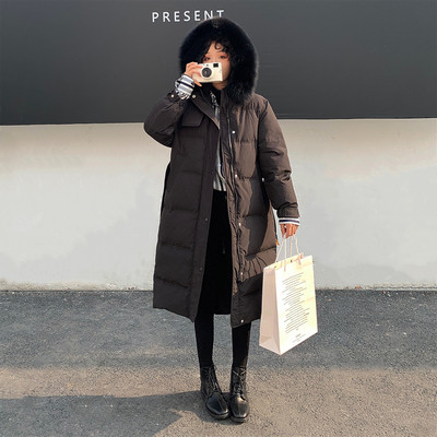 Χειμερινό μακρύ γυναικείο μπουφάν με γούνα και ζώνη