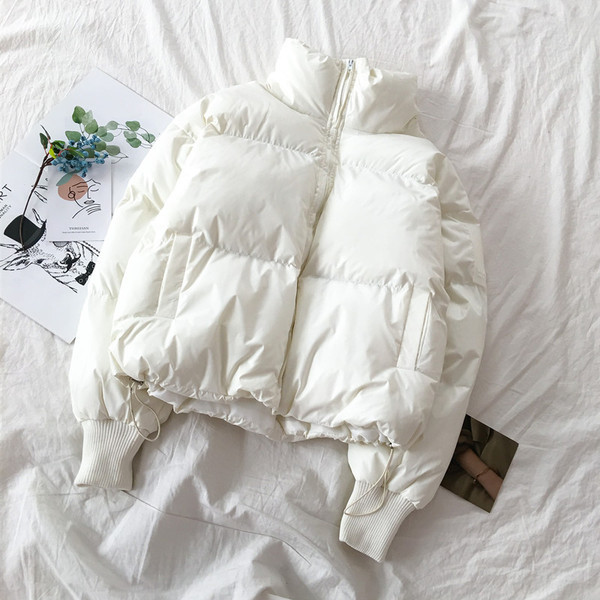 Őszi-téli női kabát cipzárral