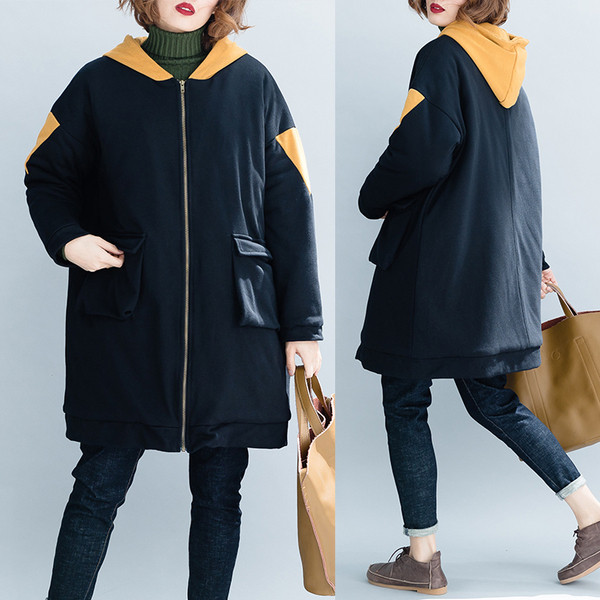 Női széles kabát kapucnival és cipzárral