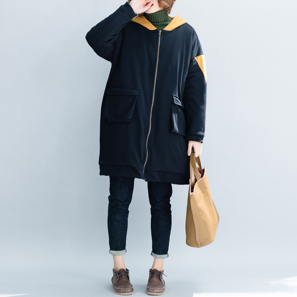 Női széles kabát kapucnival és cipzárral