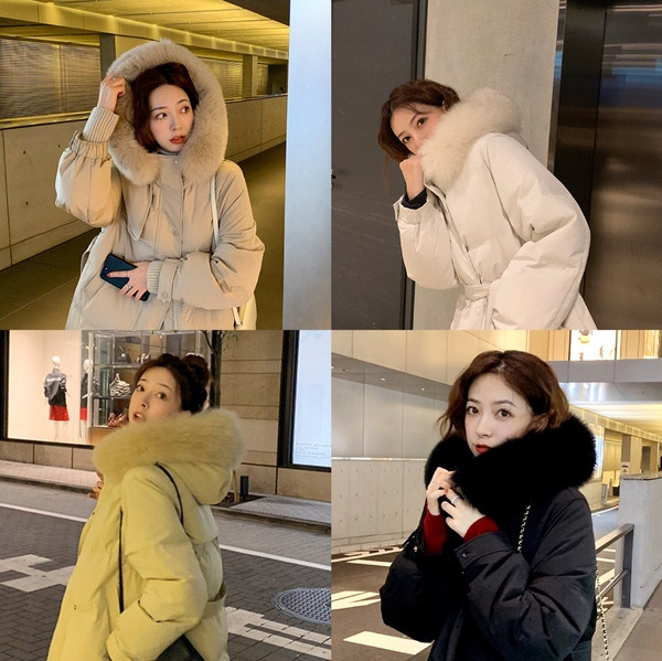 Téli hosszú női kabát derékövvel és kapucnival pehelyes