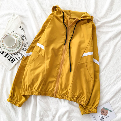 Alkalmi vékony női kabát cipzárral