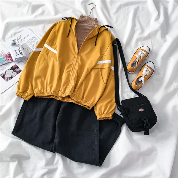 Alkalmi vékony női kabát cipzárral