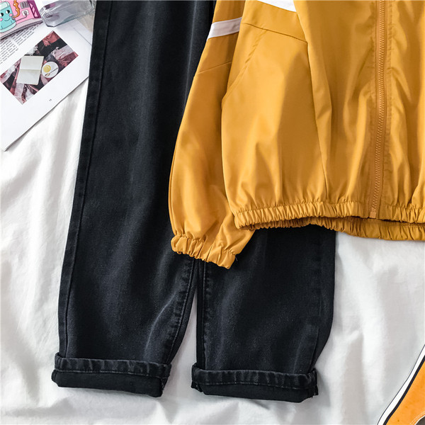 Alkalmi vékony női kabát cipzárral