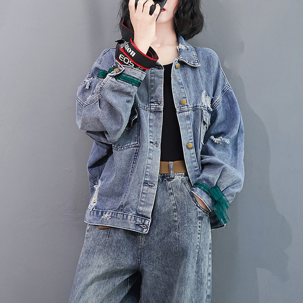 Naiste tikandi ja nööpidega teksajakk