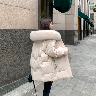 Naiste talvejope standardpikkusega ja kapuutsiga udusulega