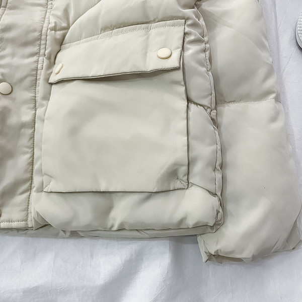 Új modell őszi-téli kabát kapucnival és zsebekkel