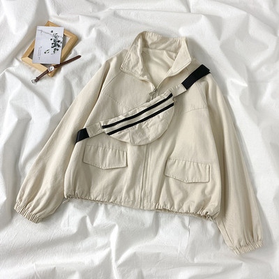 Női kabát cipzárral és zsebekkel - széles modell