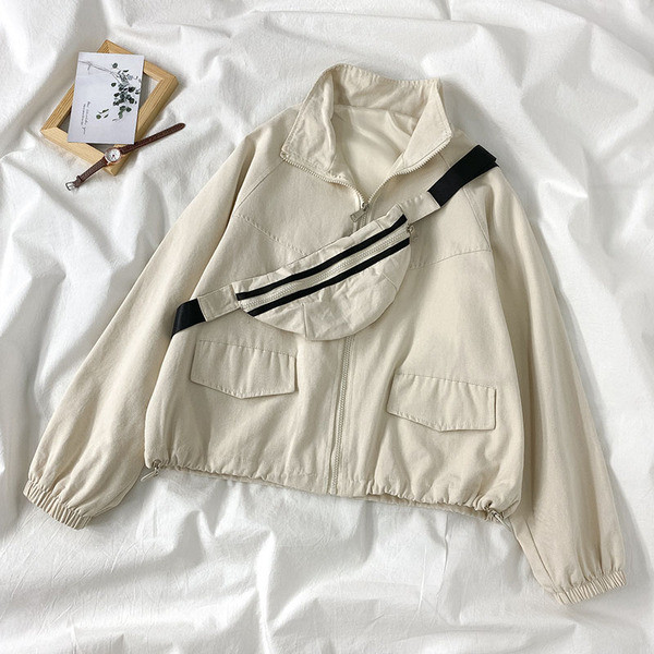 Női kabát cipzárral és zsebekkel - széles modell