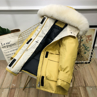 Νέο μοντέλο μακρύ παλτό με γούνα στον γιακά