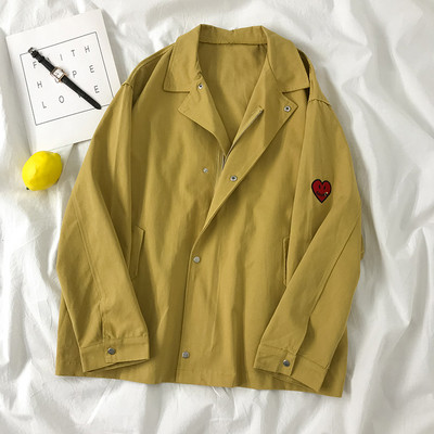 Γυναικείο ανοιξιάτικο μπουφάν με κουμπιά και έμβλημα