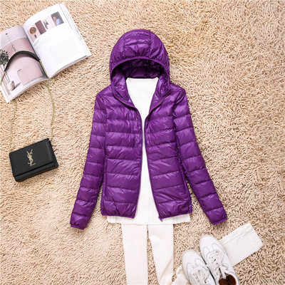 Kerge naiste jope Õhuke kapuutsi ja taskutega mudel