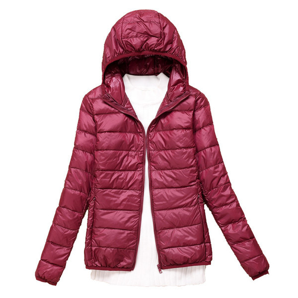 Kerge naiste jope Õhuke kapuutsi ja taskutega mudel