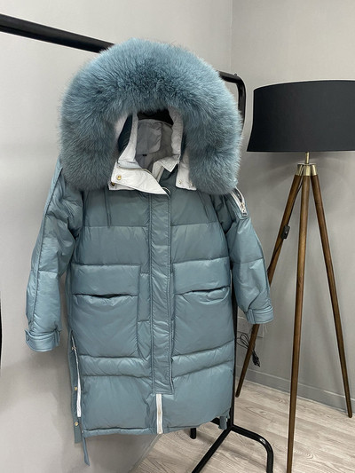 Pikk talvejope taskute ja krae küljes