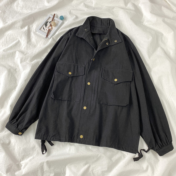 Naiste sügisjope taskute ja nööpidega