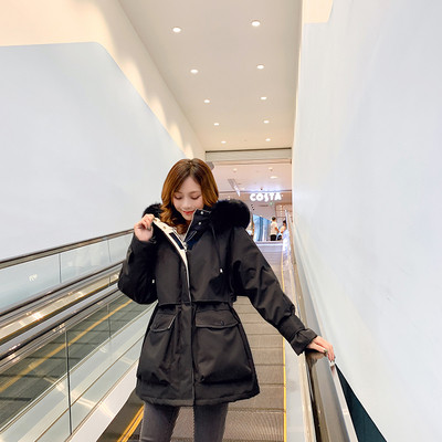 Naiste talvejope suurte taskute ja udusulega kapuutsiga