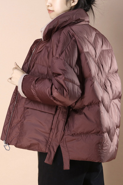 Széles modell téli kabát hasítékokkal