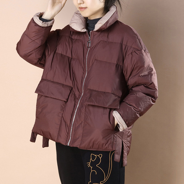 Széles modell téli kabát hasítékokkal