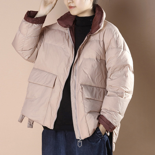 Széles modell téli kabát hasítékokkal