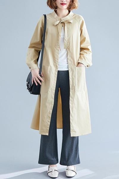 Dugačka ženska jakna - široki model sa džepovima