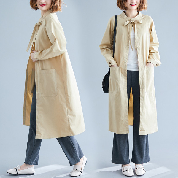 Dugačka ženska jakna - široki model sa džepovima