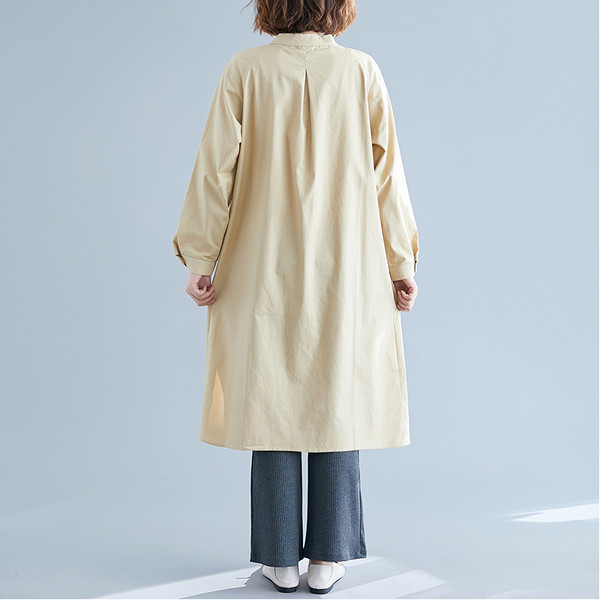 Dugačka ženska jakna - široki model sa džepovima