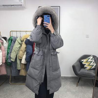 Γυναικείο μακρύ μπουφάν με γούνα και τσέπες