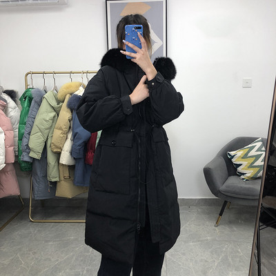 Γυναικείο μακρύ μπουφάν με γούνα και τσέπες