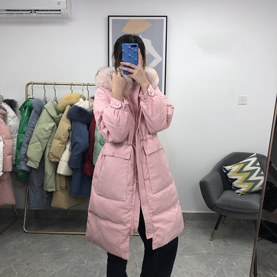 Γυναικείο μακρύ μπουφάν με γούνα και τσέπες