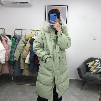 Γυναικείο μακρύ μπουφάν με γούνα και τσέπες