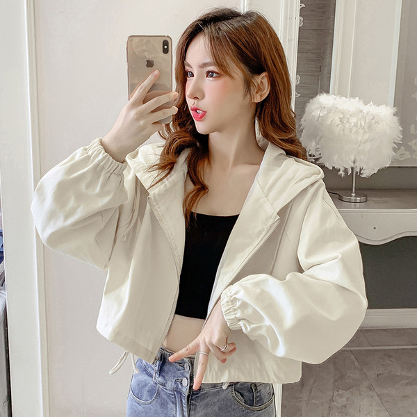 Női alkalmi kabát hosszú ujjal és kapucnival