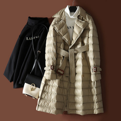 Pikk naiste veekindel jope vööga