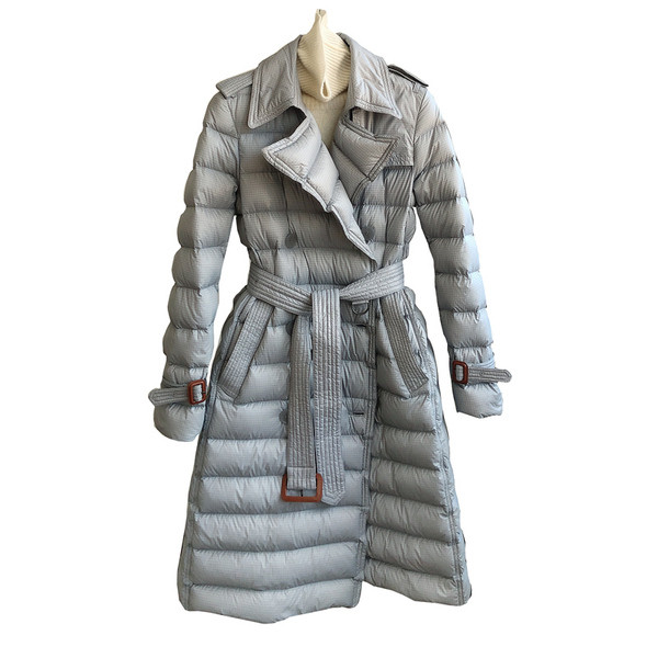 Pikk naiste veekindel jope vööga