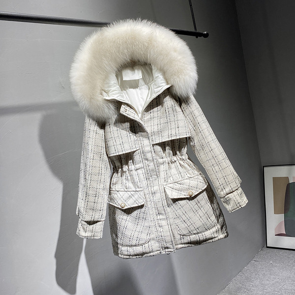 Naiste keskmise pikkusega ja udusulgedega talvejope