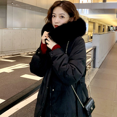 Γυναικείο χειμερινό μπουφάν με ζώνη και κουκούλα - μακρύ μοντέλο