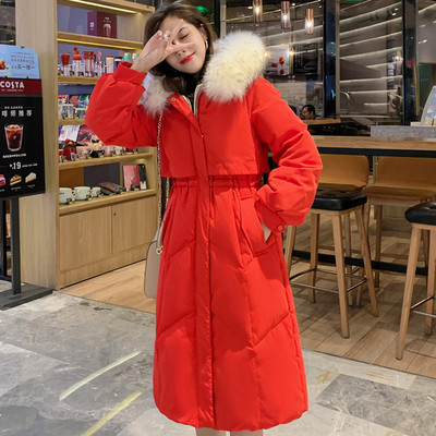 Női téli kabát derekán és lefelé a kapucniján megkötős