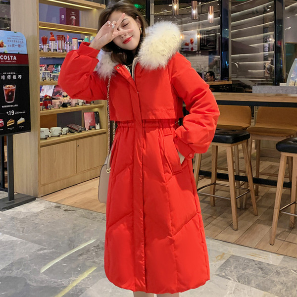 Női téli kabát derekán és lefelé a kapucniján megkötős