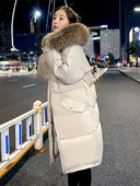 Pikk naiste talvejope kapuutsi ja taskutega