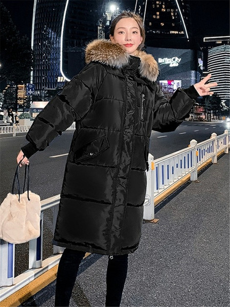 Pikk naiste talvejope kapuutsi ja taskutega